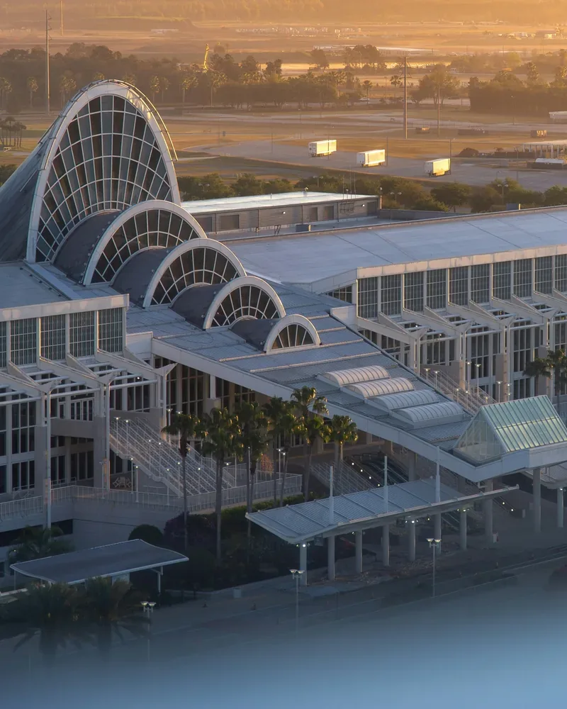 Modern Orlando convention center exterior at golden hour
